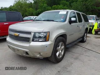 2013 Chevrolet Suburban LT with VIN 1GNSKJE74DR166223, listed as a IAAI auction lot 42172184 with 200,901 mi miles and . Bid and sale history available at DreamBid. Image 17.