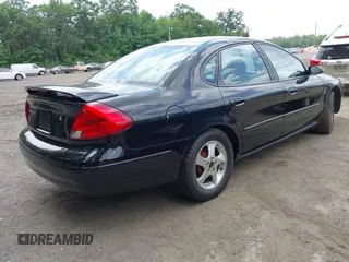 2002 Ford Taurus SES Standard with VIN 1FAFP55S92G250401, listed as a IAAI auction lot 42432014 with 231,695 mi miles and . Bid and sale history available at DreamBid. Image 4.