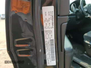 2011 Jeep Grand Cherokee Laredo with VIN 1J4RR4GGXBC567450, listed as a Copart auction lot 60056085 with 165,077 mi miles and Salvage title. Bid and sale history available at DreamBid. Image 12.