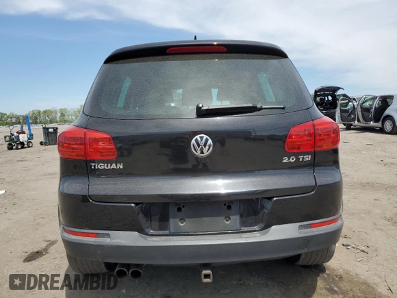 2013 Volkswagen Tiguan SE z VIN WVGAV7AX4DW523112, wystawiony jako Copart lot #53261855 z przebiegiem 86 190 mil mil oraz Szkoda całkowita • Salvage title. Historia ofert i sprzedaży dostępna na DreamBid. Obrazek 6.