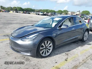 2020 Tesla Model 3 Standard Range Plus with VIN 5YJ3E1EA0LF744046, listed as a IAAI auction lot 41939894 with 102,576 mi miles. Bid and sale history available at carsss.com. Image 17.