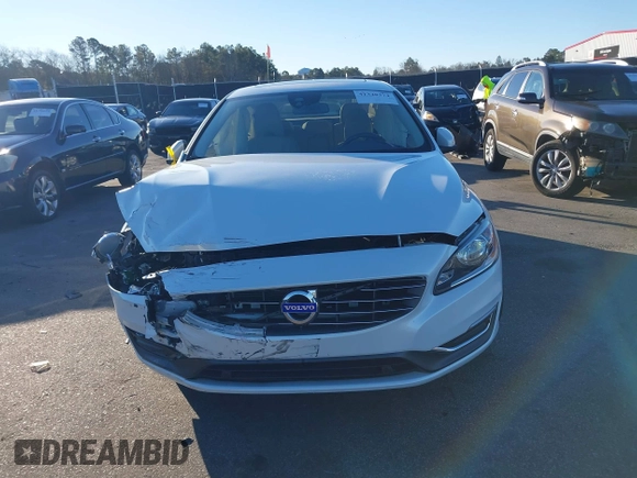 2015 Volvo S60 T5 Drive-E Premier Plus with VIN YV140MFC6F1314534, listed as a IAAI auction lot 41348374 with 81,235 mi miles. Bid and sale history available at carsss.com. Image 12.