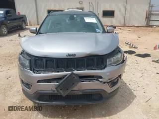 2018 Jeep Compass Latitude with VIN 3C4NJCBBXJT494116, listed as a IAAI auction lot 42150992 with 96,125 mi miles and . Bid and sale history available at DreamBid. Image 12.