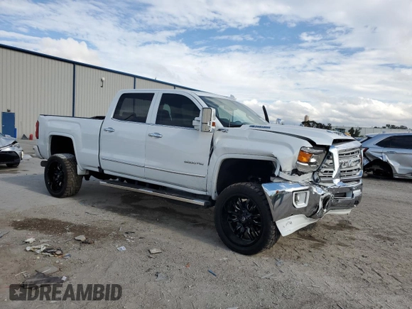 2018 GMC Sierra 2500HD SLT with VIN 1GT12TEYXJF156687, listed as a Copart auction lot 86760944 with 79,387 mi miles and Salvage Title. Bid and sale history available at carsss.com. Image 4.