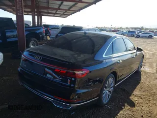 2019 Audi A8 L with VIN WAU8DAF83KN002810, listed as a IAAI auction lot 41588169 with 64,323 mi miles. Bid and sale history available at carsss.com. Image 4.