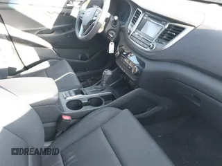 2017 Hyundai Tucson SE with VIN KM8J3CA46HU424815, listed as a IAAI auction lot 41771457 with 104,698 mi miles. Bid and sale history available at carsss.com. Image 5.