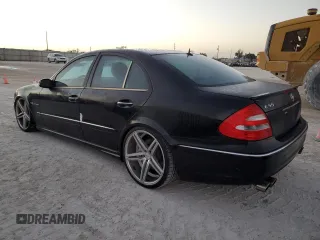 2005 Mercedes-Benz E-Class 5.5L AMG with VIN WDBUF76J05A675937, listed as a Copart auction lot 77349524 with 0 mi miles and Salvage Title. Bid and sale history available at carsss.com. Image 2.