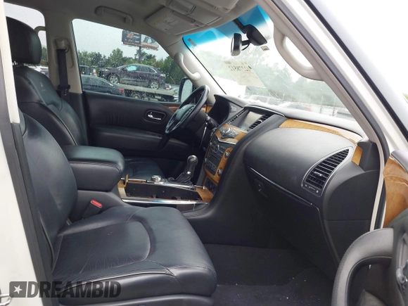 2014 Infiniti QX80 with VIN JN8AZ2NEXE9062068, listed as a IAAI auction lot 42378512 with 235,256 mi miles and . Bid and sale history available at DreamBid. Image 5.