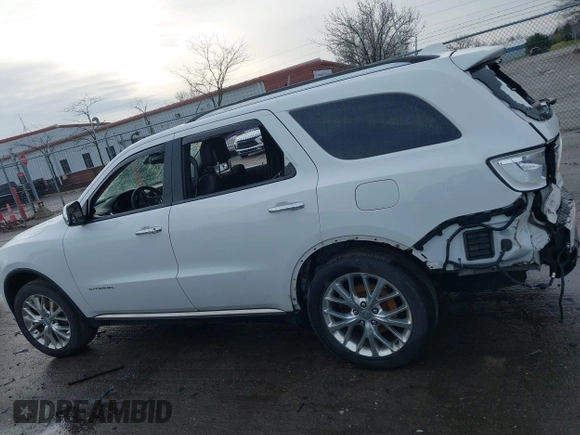 2014 Dodge Durango Citadel with VIN 1C4RDJEG0EC476018, listed as a IAAI auction lot 41212456 with 154,929 mi miles and . Bid and sale history available at DreamBid. Image 14.