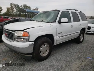 2006 GMC Yukon SLE with VIN 1GKEC13V96J109056, listed as a Copart auction lot 74724434 with 121,695 mi miles and Salvage Title. Bid and sale history available at carsss.com. Image 1.