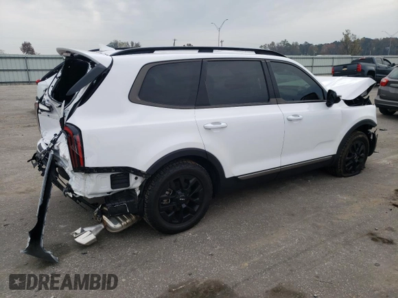 2023 Kia Telluride SX X-Line z VIN 5XYP5DGC9PG404586, wystawiony jako Copart lot #81227294 z przebiegiem 22 581 mil mil oraz Szkoda całkowita • Salvage title. Historia ofert i sprzedaży dostępna na DreamBid. Obrazek 3.