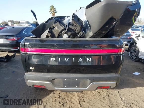 2023 Rivian R1T Adventure with VIN 7FCTGAAAXPN022097, listed as a IAAI auction lot 41235625 with 11,210 mi miles. Bid and sale history available at carsss.com. Image 17.