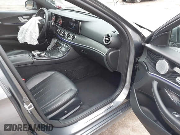 2018 Mercedes-Benz E 300 with VIN WDDZF4JB2JA342094, listed as a IAAI auction lot 41556822 with 71,630 mi miles and . Bid and sale history available at DreamBid. Image 5.
