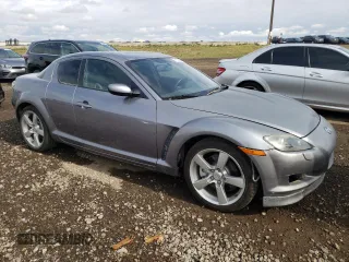 2005 Mazda RX-8 with VIN JM1FE173050145886, listed as a Copart auction lot 71110404 with 66,894 mi miles and Salvage Title. Bid and sale history available at carsss.com. Image 4.