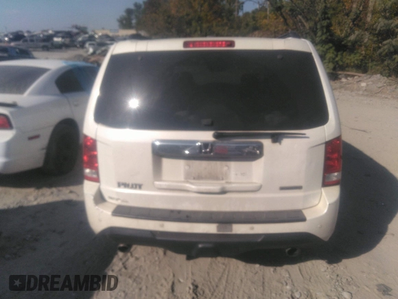 2012 Honda Pilot Touring with VIN 5FNYF3H92CB027292, listed as a IAAI auction lot 40617936 with 140,455 mi miles and . Bid and sale history available at carsss.com. Image 16.