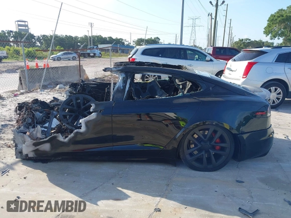 2022 Tesla Model S Plaid z VIN 5YJSA1E64NF477659, wystawiony jako IAAI lot #42358072 z przebiegiem Nie podano mil oraz . Historia ofert i sprzedaży dostępna na DreamBid. Obrazek 13.