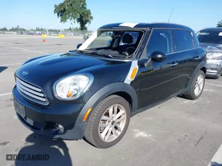 2013 MINI Cooper Countryman with VIN WMWZB3C52DWM07621, listed as a IAAI auction lot 42085389 with 153,714 mi miles. Bid and sale history available at carsss.com. Image 17.