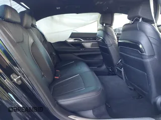2019 BMW 7 Series 740i with VIN WBA7E2C58KB218419, listed as a IAAI auction lot 41831080 with 97,752 mi miles and . Bid and sale history available at DreamBid. Image 8.