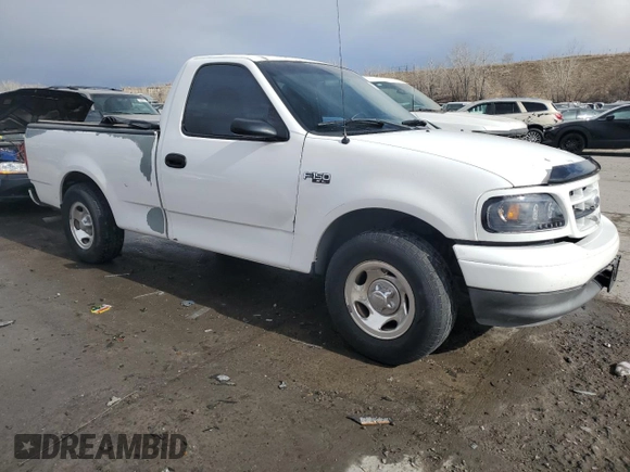 2002 Ford F-150 XL with VIN 1FTRF17212KC06180, listed as a Copart auction lot 45336625 with 214,139 mi miles and Salvage title. Bid and sale history available at DreamBid. Image 4.