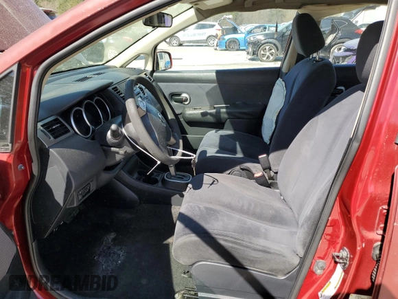 2009 Nissan Versa 1.8 S with VIN 3N1BC11E19L382090, listed as a Copart auction lot 49597565 with 203,464 mi miles and Salvage Title. Bid and sale history available at carsss.com. Image 7.