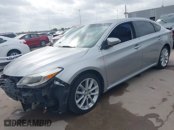 2015 Toyota Avalon Limited with VIN 4T1BK1EB2FU149980, listed as a IAAI auction lot 41897411 with 136,507 mi miles and . Bid and sale history available at DreamBid. Image 2.