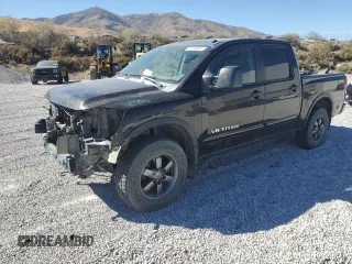 2014 Nissan Titan S with VIN 1N6AA0EC1EN510658, listed as a Copart auction lot 75210054 with Not Provided miles and Salvage Title. Bid and sale history available at DreamBid. Image 1.