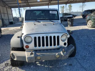2009 Jeep Wrangler Unlimited X with VIN 1J4GA39179L756228, listed as a Copart auction lot 50086445 with 158,274 mi miles and Salvage Title. Bid and sale history available at carsss.com. Image 5.
