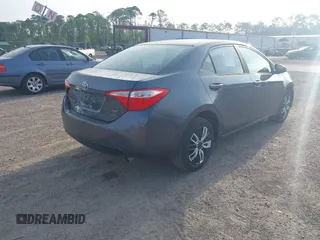2015 Toyota Corolla L with VIN 5YFBURHE0FP283354, listed as a IAAI auction lot 41530183 with 165,228 mi miles and . Bid and sale history available at DreamBid. Image 4.