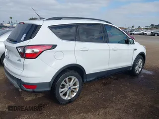 2017 Ford Escape SE with VIN 1FMCU9GD3HUD95726, listed as a IAAI auction lot 42121586 with 96,048 mi miles. Bid and sale history available at carsss.com. Image 4.