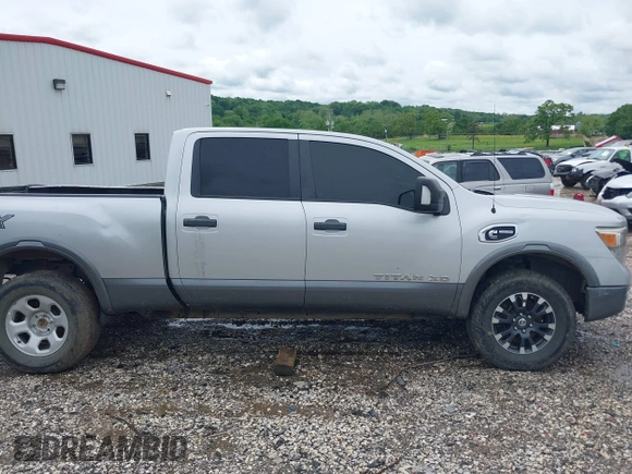 2017 Nissan Titan Pro-4X z VIN 1N6BA1F45HN529090, wystawiony jako IAAI lot #42163486 z przebiegiem 162 226 mil mil oraz . Historia ofert i sprzedaży dostępna na DreamBid. Obrazek 14.