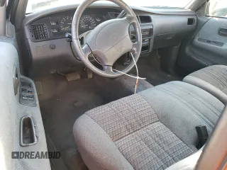 1995 Toyota T100 SR5 with VIN JT4VD12F1S0004904, listed as a Copart auction lot 75796804 with 182,011 mi miles and Salvage Title. Bid and sale history available at DreamBid. Image 8.
