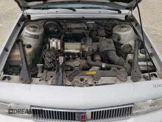 1992 Oldsmobile Cutlass z VIN 1G3AL54N7N6363365, wystawiony jako Copart lot #76144254 z przebiegiem 52 896 mil mil oraz Tytuł czysty. Historia ofert i sprzedaży dostępna na DreamBid. Obrazek 11.