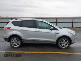 2015 Ford Escape Titanium with VIN 1FMCU9J97FUA84589, listed as a IAAI auction lot 41688156 with 129,073 mi miles. Bid and sale history available at carsss.com. Image 14.