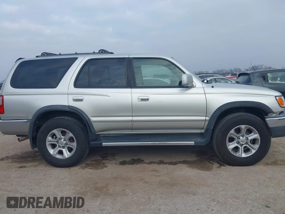 1999 Toyota 4Runner SR5 z VIN JT3GN86R1X0123115, wystawiony jako IAAI lot #41505478 z przebiegiem 173 141 mil mil oraz . Historia ofert i sprzedaży dostępna na DreamBid. Obrazek 14.