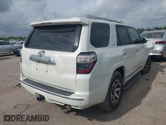 2014 Toyota 4Runner SR5 with VIN JTEZU5JR7E5080554, listed as a IAAI auction lot 42134833 with 170,077 mi miles and . Bid and sale history available at DreamBid. Image 4.