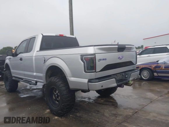 2015 Ford F-150 XL with VIN 1FTEX1C86FKE20397, listed as a IAAI auction lot 42203979 with 101,695 mi miles and . Bid and sale history available at DreamBid. Image 14.