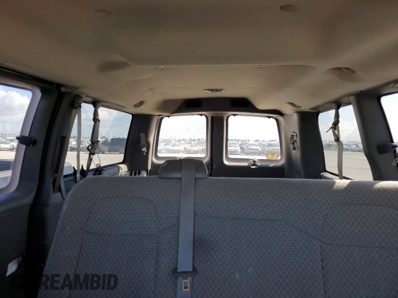 2012 Chevrolet Express Passenger 1LT z VIN 1GAZGYFG6C1134377, wystawiony jako Copart lot #75669234 z przebiegiem Nie podano mil oraz Nie do naprawy • Non repairable. Historia ofert i sprzedaży dostępna na DreamBid. Obrazek 10.