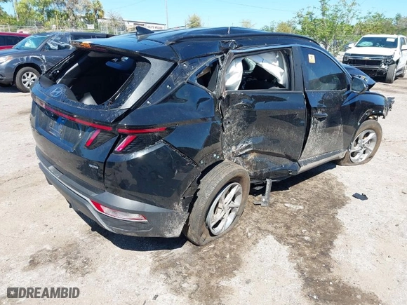 2023 Hyundai Tucson SEL with VIN 5NMJBCAE6PH236477, listed as a IAAI auction lot 41841292 with 69,481 mi miles. Bid and sale history available at carsss.com. Image 4.