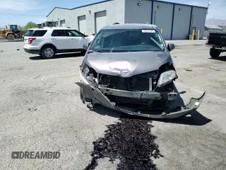 2017 Toyota Sienna LE Auto Access Seat with VIN 5TDKZ3DC1HS820732, listed as a Copart auction lot 54251475 with 104,560 mi miles and Salvage title. Bid and sale history available at DreamBid. Image 14.