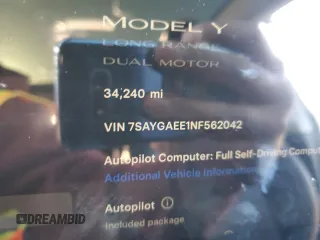 2022 Tesla Model Y Long Range with VIN 7SAYGAEE1NF562042, listed as a Copart auction lot 45702845 with 34,240 mi miles and Salvage Title. Bid and sale history available at carsss.com. Image 9.