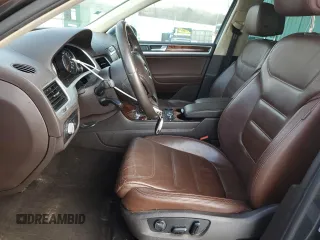2011 Volkswagen Touareg Sport with VIN WVGFF9BPXBD005821, listed as a Copart auction lot 49391505 with 111,938 mi miles and Salvage Title. Bid and sale history available at DreamBid. Image 7.