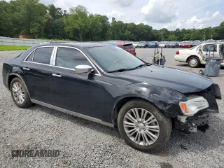 2012 Chrysler 300 C with VIN 2C3CCAKTXCH151465, listed as a Copart auction lot 65820264 with 132,609 mi miles and Salvage Title. Bid and sale history available at DreamBid. Image 4.
