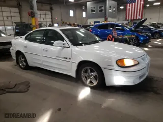 2001 Pontiac Grand Am GT1 with VIN 1G2NV52EX1C228458, listed as a Copart auction lot 76138094 with 118,833 mi miles and Clean Title. Bid and sale history available at carsss.com. Image 4.