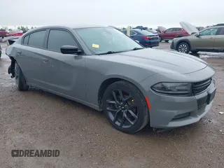 2019 Dodge Charger SXT with VIN 2C3CDXBG7KH554272, listed as a IAAI auction lot 41964492 with 126,174 mi miles. Bid and sale history available at carsss.com. Image 1.