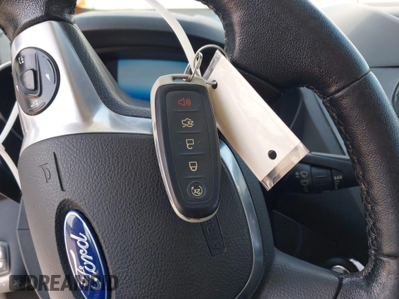 2015 Ford Escape Titanium with VIN 1FMCU0JX4FUB07322, listed as a IAAI auction lot 42220345 with 184,852 mi miles and . Bid and sale history available at DreamBid. Image 11.