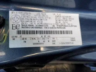 2018 Ford Focus Titanium z VIN 1FADP3N2XJL297048, wystawiony jako Copart lot #61579925 z przebiegiem 68 774 mil mil oraz Szkoda całkowita • Salvage title. Historia ofert i sprzedaży dostępna na DreamBid. Obrazek 12.