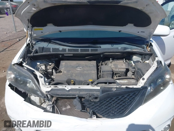 2014 Toyota Sienna SE with VIN 5TDXK3DC0ES477207, listed as a IAAI auction lot 41624619 with 213,881 mi miles and . Bid and sale history available at DreamBid. Image 10.