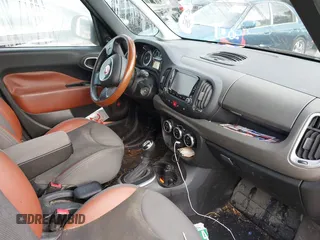 2014 FIAT 500L Trekking with VIN ZFBCFADH5EZ018176, listed as a IAAI auction lot 42680958 with 106,806 mi miles and . Bid and sale history available at DreamBid. Image 5.