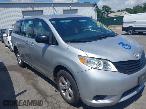 2014 Toyota Sienna L with VIN 5TDZK3DC9ES518653, listed as a IAAI auction lot 42767591 with 261,730 mi miles and . Bid and sale history available at DreamBid. Image 1.