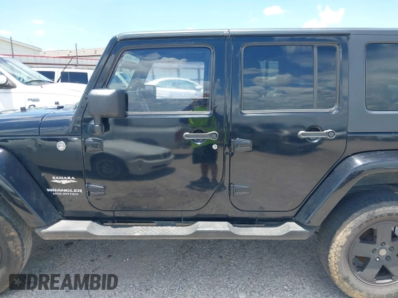2007 Jeep Wrangler Unlimited Sahara with VIN 1J4GA59187L187656, listed as a IAAI auction lot 42554114 with 200,840 mi miles and . Bid and sale history available at DreamBid. Image 14.